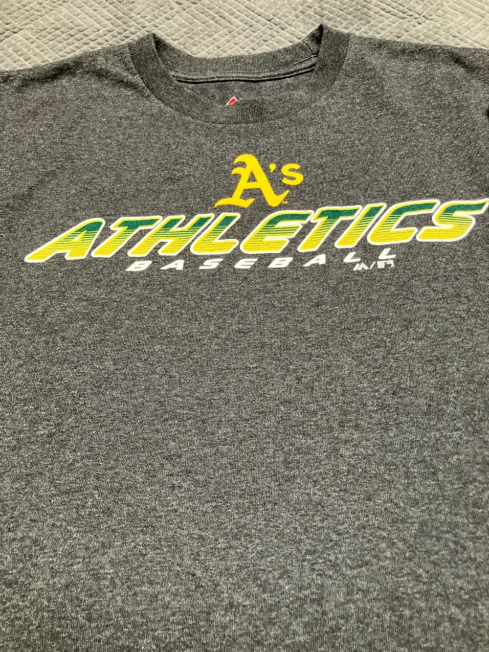 Majestic Gray A’s crew neck T with gray, yellow, and white. 661